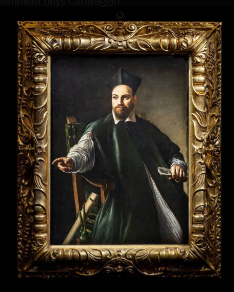 A portrait of a man in formal attire seated in a chair, wearing a black cap and green cloak, with an ornate gold frame.