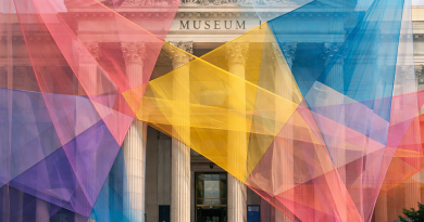 Museum entrance covered with overlapping transparent colorful fabrics