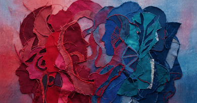 Layered fabric silhouettes of human heads in red and blue colors.