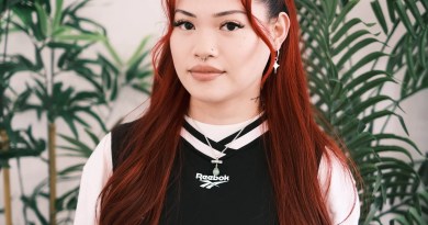 Professional portrait of Greta, known as Tatmegreta, resident junior tattoo artist specializing in fine line, romantic, and whimsical tattoos at Something Cool Tattoo in Edmonton, Canada.