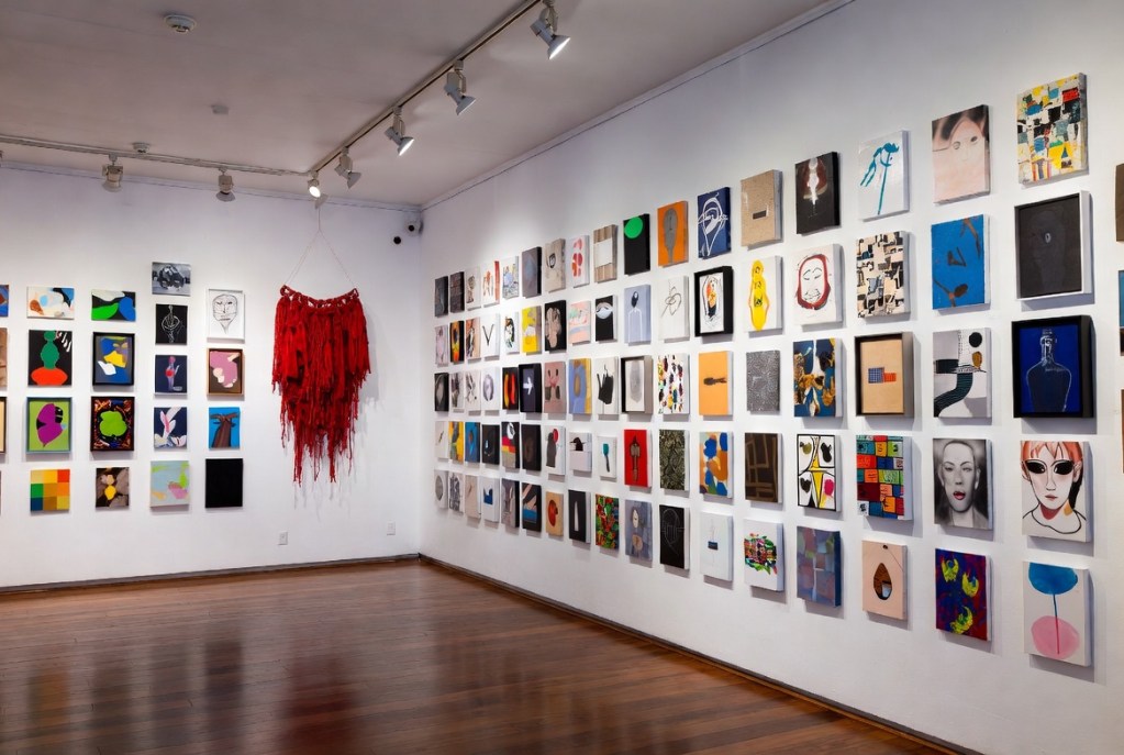 "AI-generated 16:9 illustration of the Art (by) Dealers exhibition installation at White Columns, showing colorful anonymous artworks in a salon-style hang."