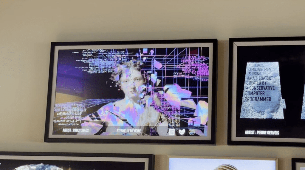Framed digital NFT artworks with glitch art portraits and code overlays exhibited on screens at The Gates Hotel South Beach for the Crypto Core show.