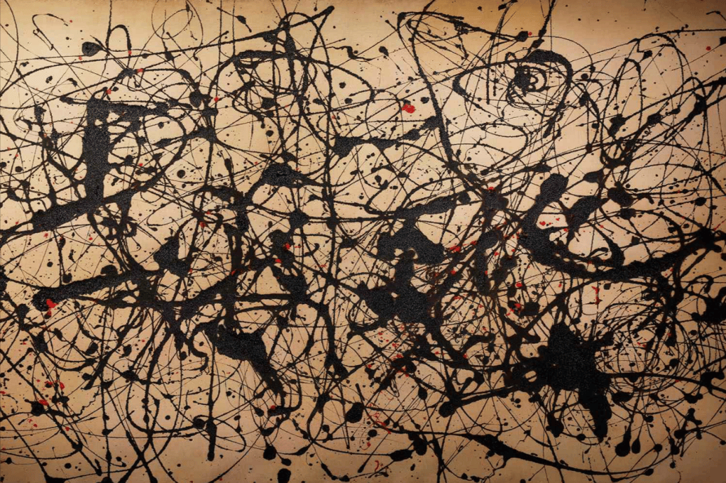 Large horizontal abstract drip painting by Jackson Pollock with black and red enamel on beige canvas, displayed in a gallery.
