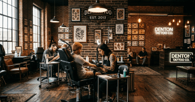 Tattoo artists creating tattoos for clients inside a spacious, vintage-style tattoo studio