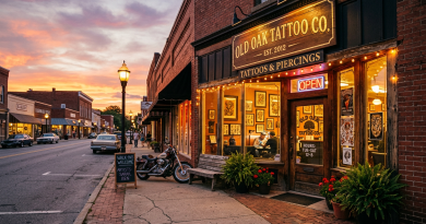 Small-town tattoo shop exterior at sunset glow